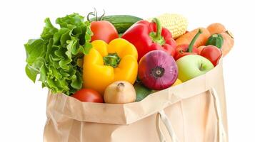 Healthy food concept. Paper bag filled with nutritious items on white background photo