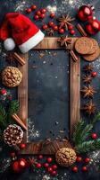 Holiday frame with festive decorations like Santa hat, pine cones, and gingerbread cookies photo