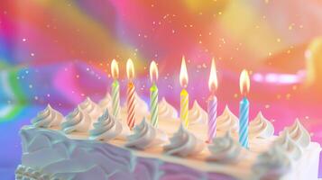 White vanilla birthday cake with lit candles on colorful background. celebration and joy for parties photo