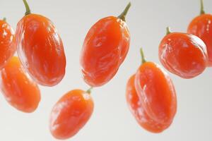 A dynamic 3D of fresh, juicy goji berries, shown in close up against a stark white background. The photo
