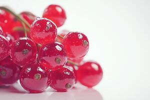 A dynamic 3D of fresh, juicy red currants, shown in close up against a stark white background. The photo