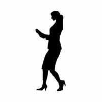 Silhouette of a woman walking with a cell phone vector