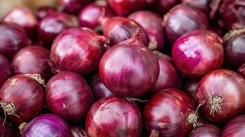 Aromatic ripe red onions heap photo