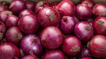 Aromatic ripe red onions heap photo