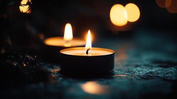 Several candles burning with limited depth of field photo