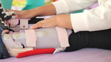 Child cerebral palsy disability, legs orthosis. video