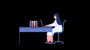 A woman in a lab coat is working on a computer video
