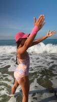 An Exciting and Joyful Beach Day Enjoying Fun and Laughter in the Rolling Waves of the Ocean video
