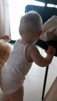 A Curious Baby is Enthusiastically Exploring a Bright, Modern Space Filled with Joyful Delights video