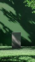 Slightly dark green wall with shadow and gray blocks stage podium story background photo
