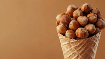 Hazelnuts on brown paper wrapped eco friendly container photo