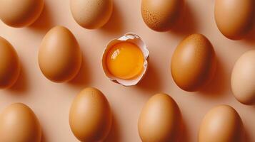 Egg pattern with a distinct anomaly of crushed shell showing egg yolk photo