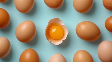 Egg pattern with a distinct anomaly of crushed shell showing egg yolk photo