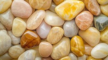 Abstract pattern yellow gravel stones smooth glossy texture marble polished photo