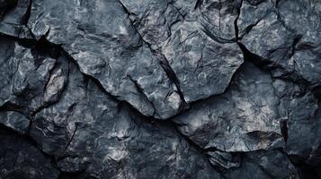 Black rock texture surface closeup with crack abstract scratch rustic pattern photo