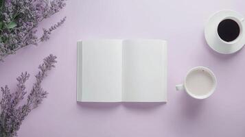 Blank white open book and coffee drink and purple copy space background photo