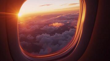 Plane window capturing breathtaking orange beauty view sunset from journey photo