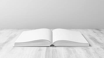 Open blank white paper book on wooden table side view copy space background photo