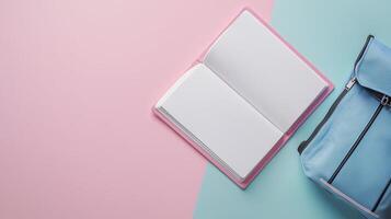 Blank white book open white school bag top of view copy space background photo