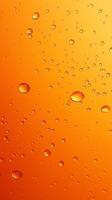 Waterdrop bubble splashing rounded on yellow blurred background photo