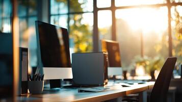 A computer monitor is sitting on a desk in front of a window photo