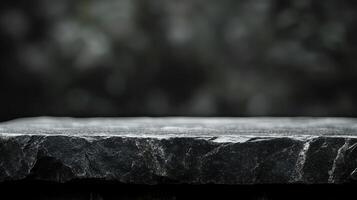 A black stone slab on a table with a blurred background photo