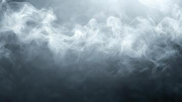 Smoke on a black background with a bright light photo