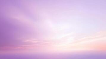 A purple sky with clouds and a purple sunset photo