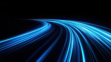 Light trails on a black road photo