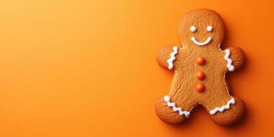 Gingerbread gingerbread man on orange background photo