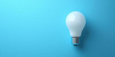 A light bulb on a blue background photo