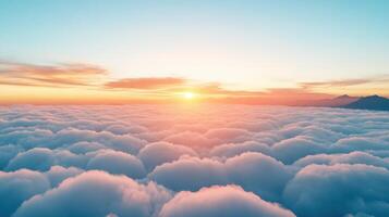 The sun is setting over the clouds in this photo