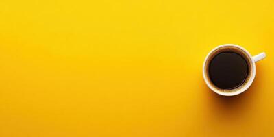 Coffee cup on yellow background photo