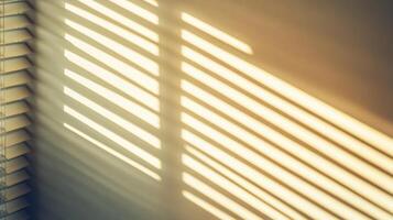 Sunlight shining through blinds on a wall photo