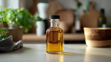 A bottle of olive oil on a table photo