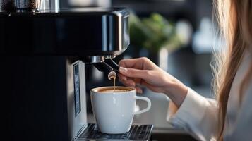 A woman is pouring coffee into a cup photo