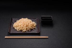 Rice noodles with mushrooms, vegetables, spices and herbs photo