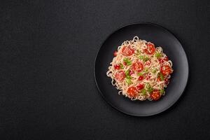 Rice noodles with mushrooms, vegetables, spices and herbs photo