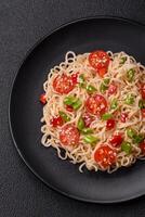 Rice noodles with mushrooms, vegetables, spices and herbs photo
