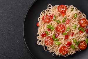 Rice noodles with mushrooms, vegetables, spices and herbs photo