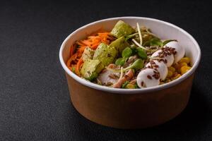 Delicious diet salad with turkey or chicken slices, lettuce, carrots, mozzarella photo