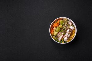 Delicious diet salad with turkey or chicken slices, lettuce, carrots, mozzarella photo