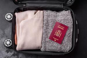 International passport of a citizen of Spain on a suitcase photo