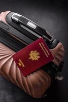 International passport of a French citizen on a suitcase photo