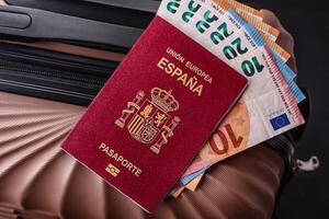International passport of a citizen of Spain on a suitcase photo