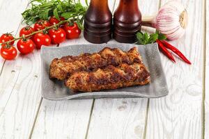 Chicken kebab minced meat and spices photo