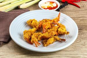 Golden deep prawn tempura wuth sauce photo
