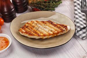 Grilled turkey fillet steak with sauce photo