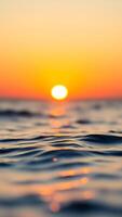 Sunset Reflected in Rippling Water photo