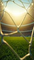 Soccer Goal Net Close-up With Blurred Green Field and Stadium Lights photo